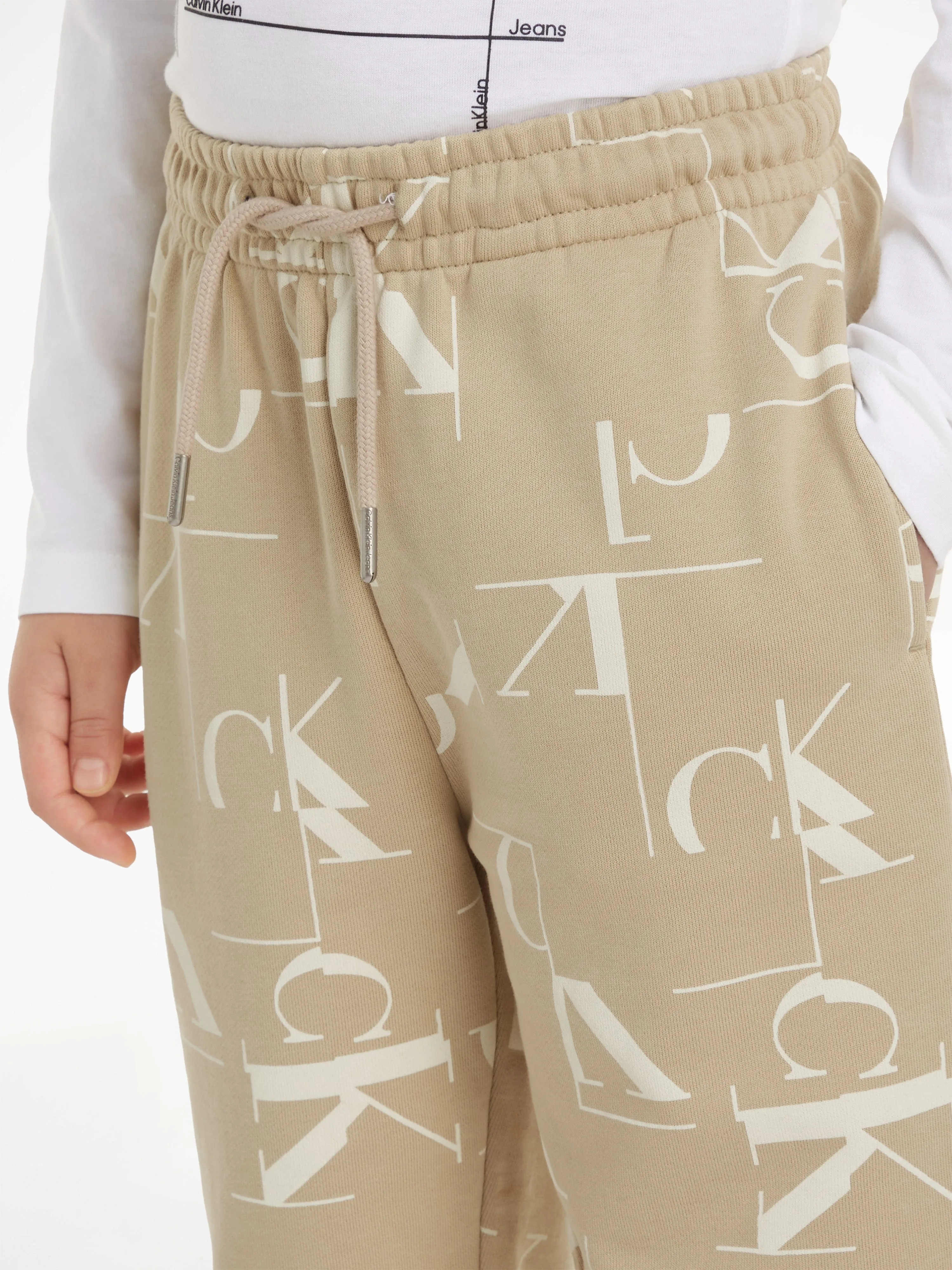 Calvin Klein Boys City Grid AOP Joggers in Beige