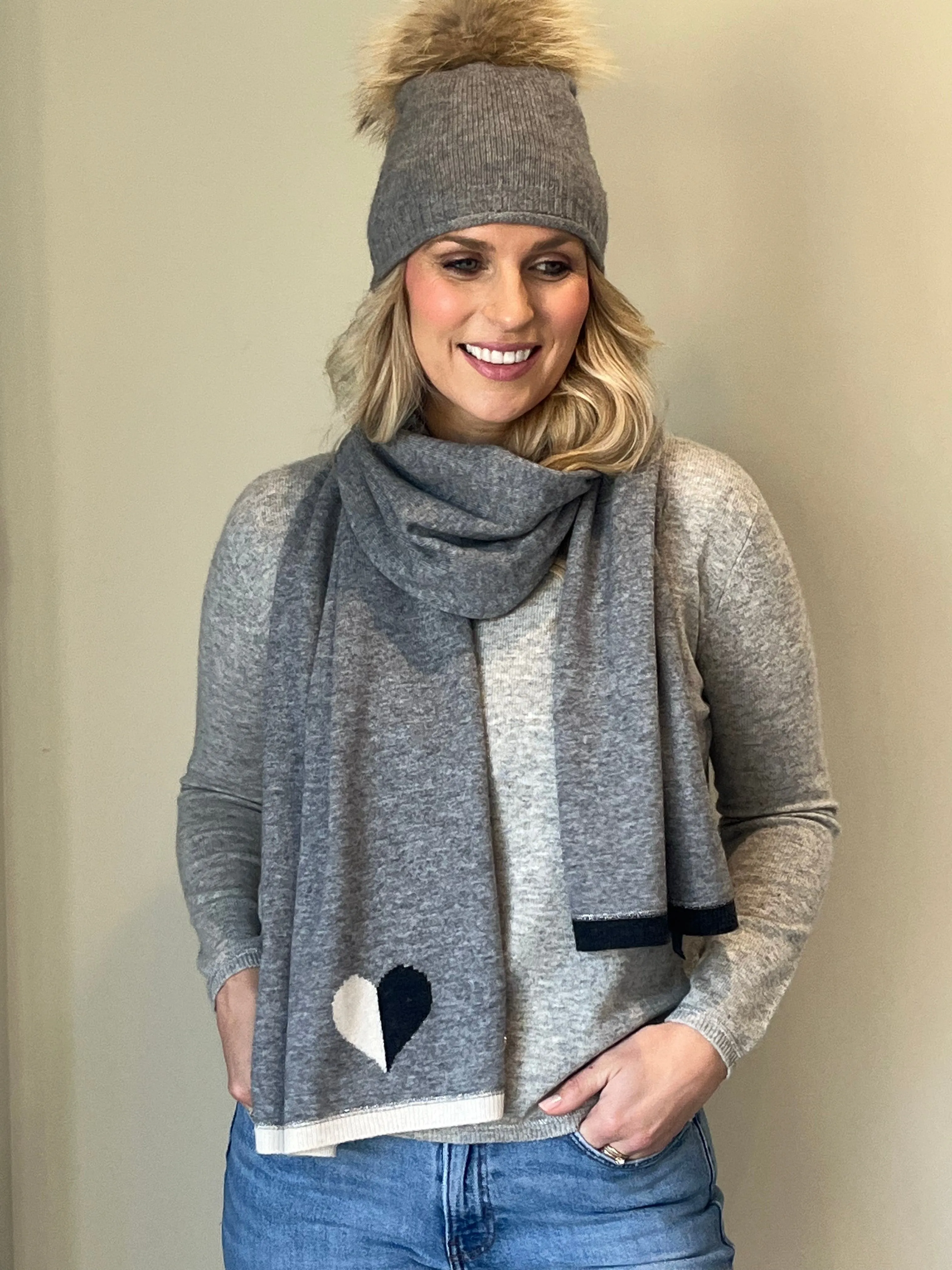 Grey cashmere plain knit beanie with faux fur pom