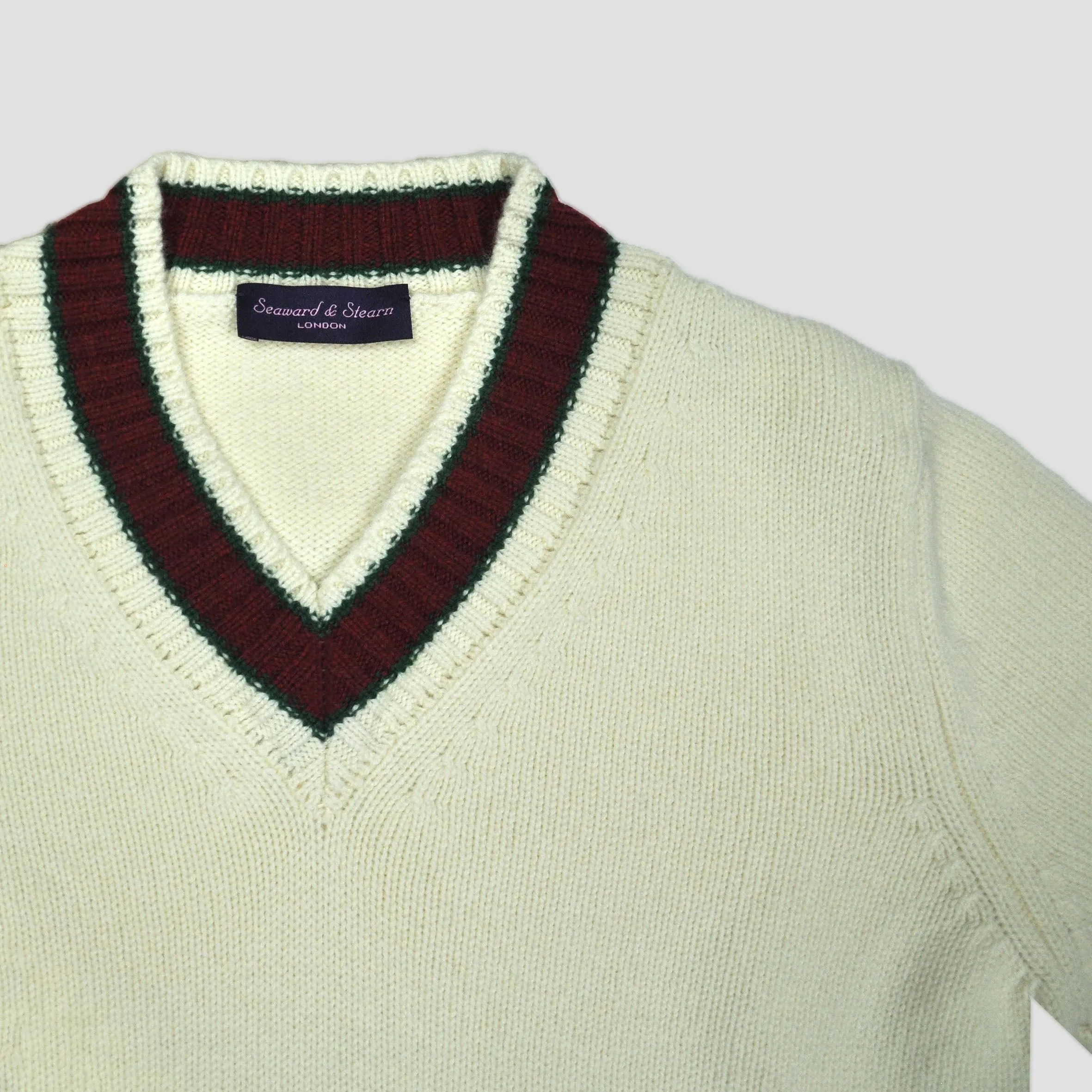 Merino Wool V-Neck Cricket Style Jumper in White with Green & Red Trim